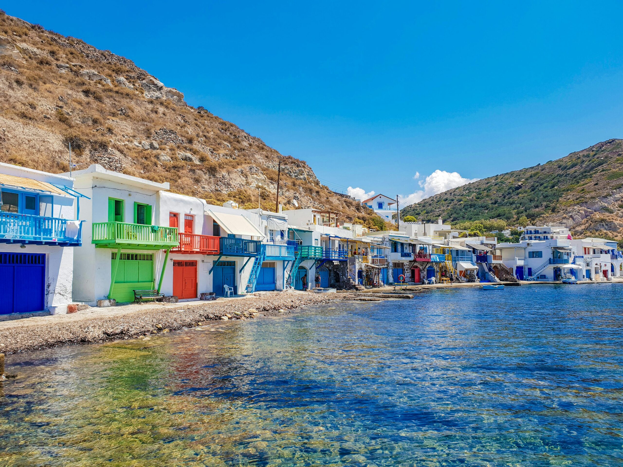Vibrant Greek architecture along the coast in Mandrakia, Milos, Greece.